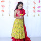 PINK RUFFLED BLOUSE WITH YELLOW ANIMAL PRINT LEHENGA SET